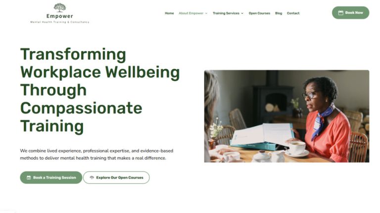 Empower's redesigned homepage with the headline 'Transforming Workplace Wellbeing Through Compassionate Training' and a photo of a woman reading at a table